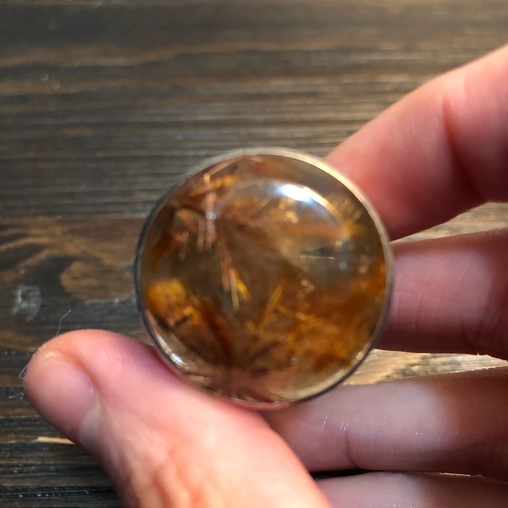 Rutilated quartz ring.